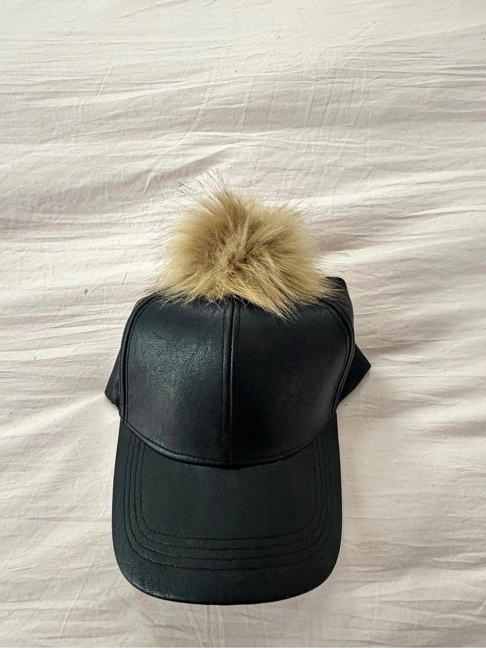 New Era Faux Fur Pom Trucker Hat in Black Like New
